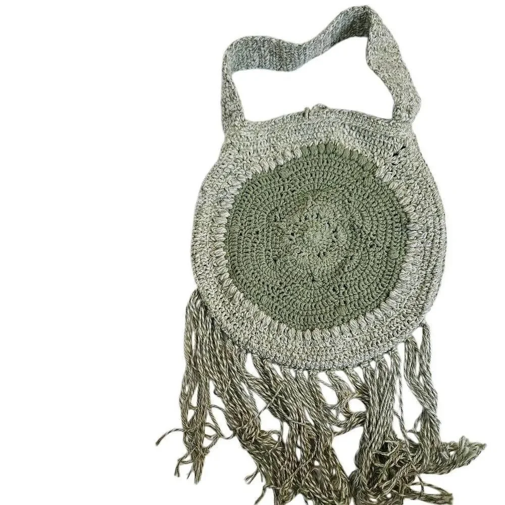 Handmade crocheted sage green boho purse with fringe.